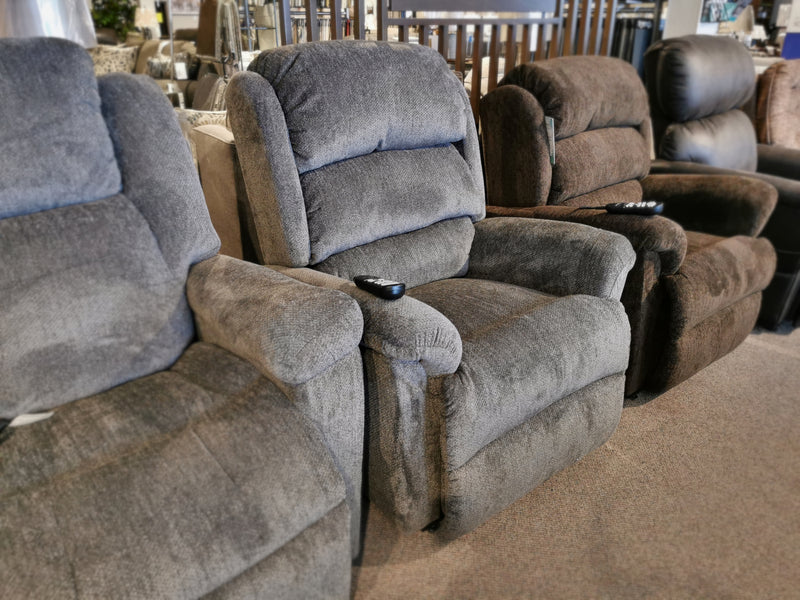 A row of Polaris Power Lift Recliners from Ultra Comfort, each with a built-in remote on the right armrest.