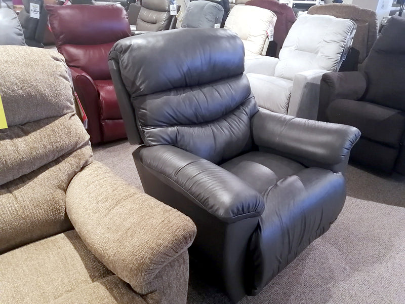 The showroom displays several La-Z-Boy Joshua Leather Rocker Recliners with comfort and style.
